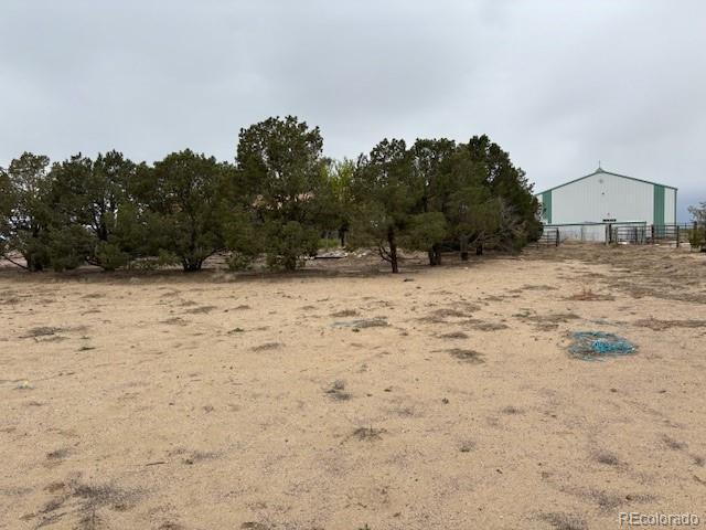 9707 County Lane 22.5, Sugar City, CO 81076 - view of yard featuring a view of countryside