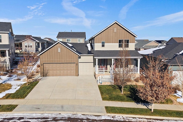 view of front of house with a garage and covered porch