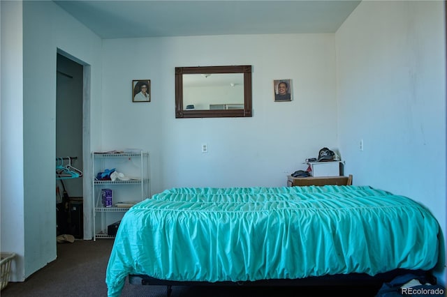 bedroom with dark carpet