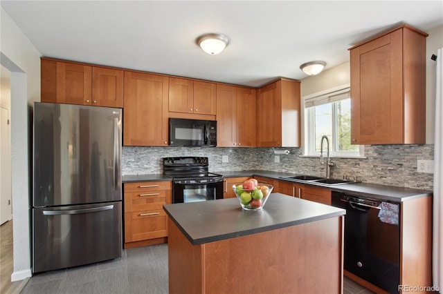 12235 Garfield Pl, Thornton, CO 80241 - kitchen with black appliances, dark countertops, and decorative backsplash