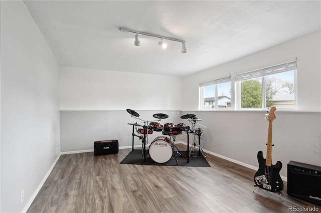 12235 Garfield Pl, Thornton, CO 80241 - recreation room featuring track lighting and wood finished floors