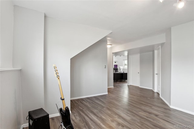 12235 Garfield Pl, Thornton, CO 80241 - spare room featuring wood finished floors and baseboards