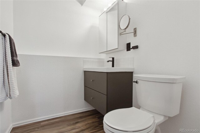 12235 Garfield Pl, Thornton, CO 80241 - half bath with vanity and wood finished floors