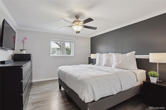 12235 Garfield Pl, Thornton, CO 80241 - bedroom featuring wood finished floors, ornamental molding, and ceiling fan