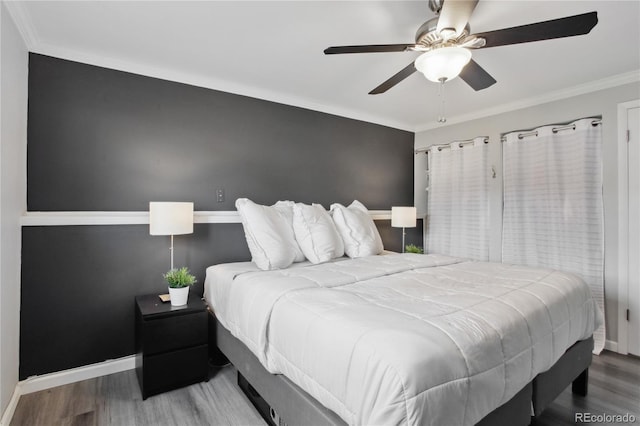 12235 Garfield Pl, Thornton, CO 80241 - bedroom with wood finished floors, crown molding, and ceiling fan