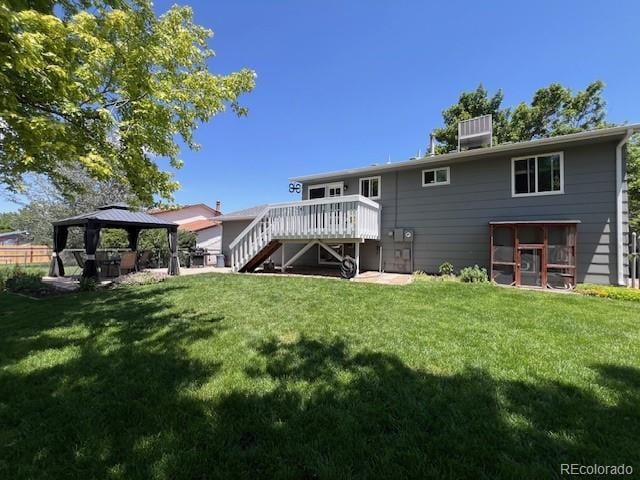 12235 Garfield Pl, Thornton, CO 80241 - rear view of property with a gazebo, stairs, a yard, and a wooden deck