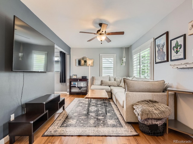 4747 S Elati St, Englewood, CO 80110 - living area featuring a ceiling fan and wood finished floors