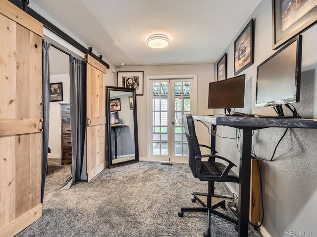 4747 S Elati St, Englewood, CO 80110 - carpeted office featuring a barn door and baseboards