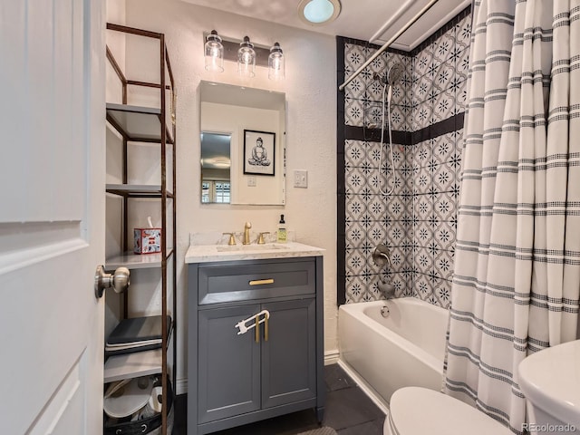 4747 S Elati St, Englewood, CO 80110 - full bathroom featuring shower / bath combo, vanity, and a textured wall