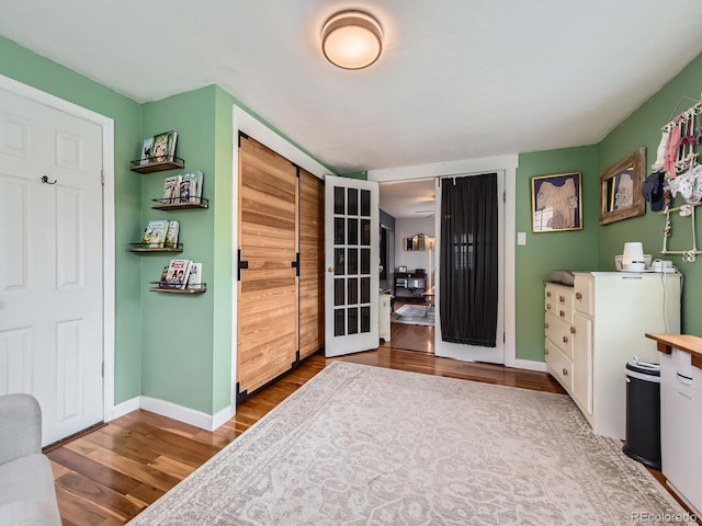 4747 S Elati St, Englewood, CO 80110 - bedroom with wood finished floors and french doors