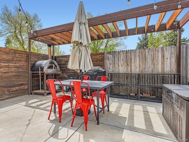 4747 S Elati St, Englewood, CO 80110 - fenced backyard with a patio, a grill, and outdoor dining area