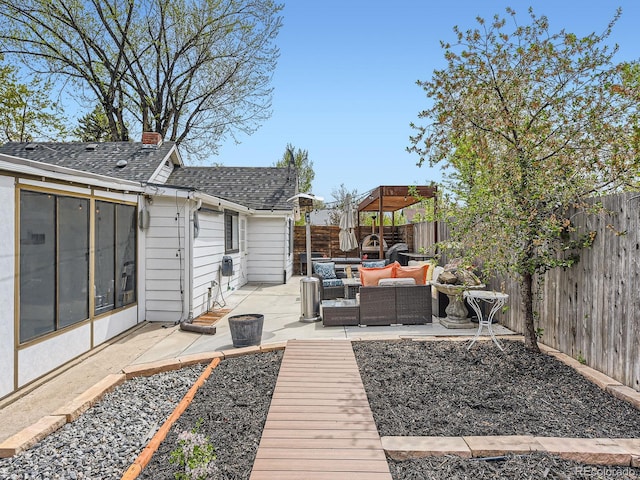4747 S Elati St, Englewood, CO 80110 - fenced backyard with outdoor lounge area and a patio area