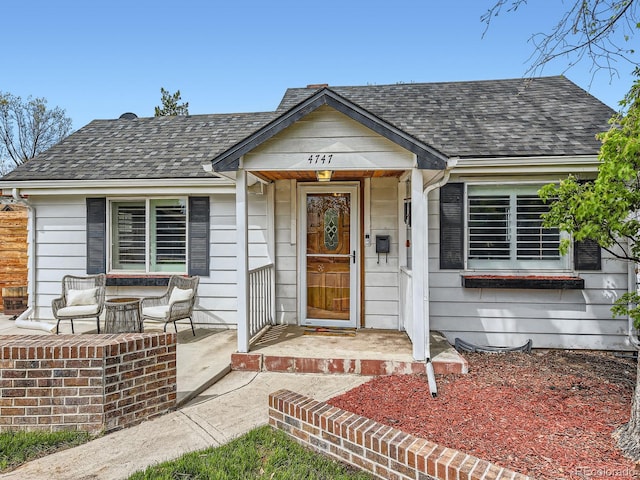4747 S Elati St, Englewood, CO 80110 - view of front of house featuring roof with shingles