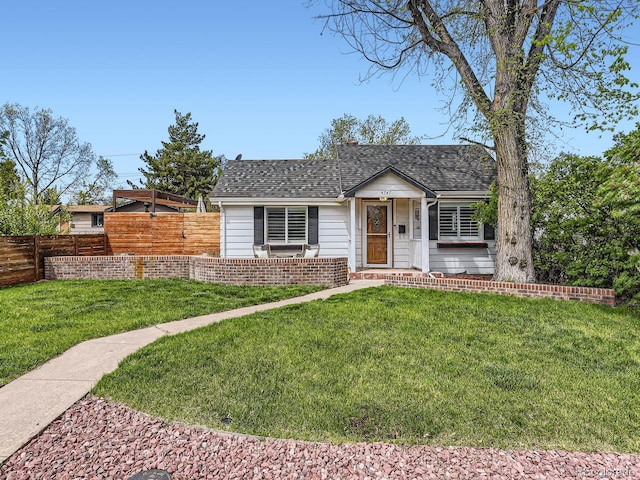 4747 S Elati St, Englewood, CO 80110 - view of front of home with a shingled roof and brick siding