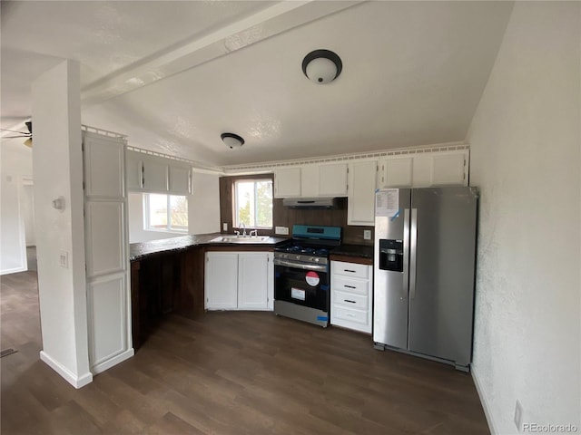 kitchen with sink, dark wood-type flooring, ceiling fan, stainless steel appliances, and white cabinets