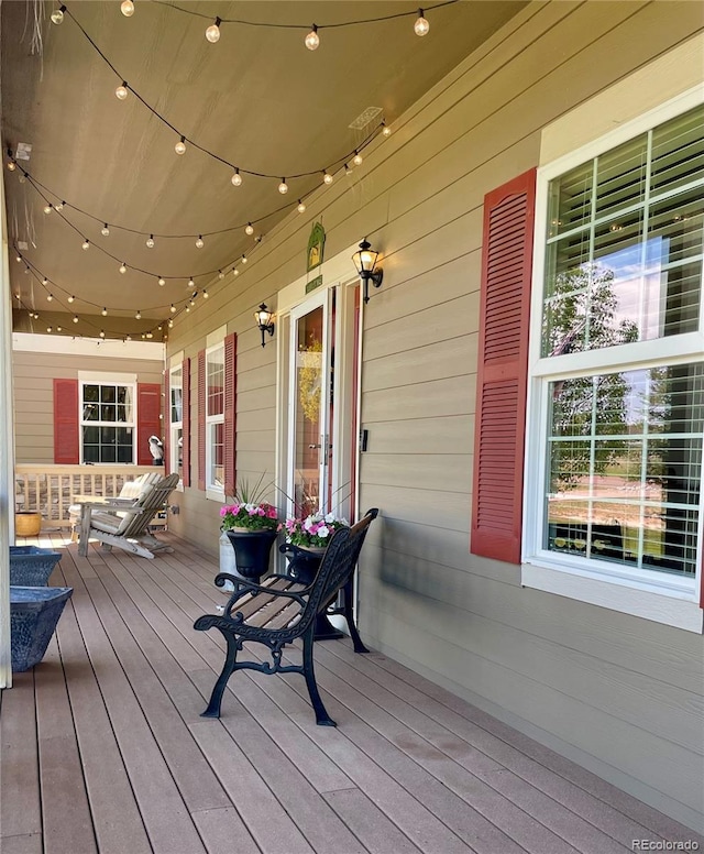 690 Antelope Dr, Bennett, CO 80102 - view of wooden porch