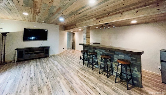 690 Antelope Dr, Bennett, CO 80102 - indoor dry bar with wood finished floors and recessed lighting