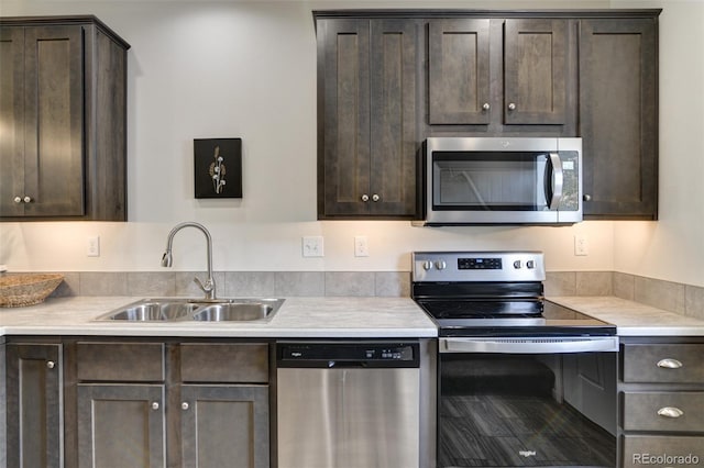 304 Barnwood Dr, Buena Vista, CO 81211 - kitchen with appliances with stainless steel finishes, dark brown cabinets, and light countertops
