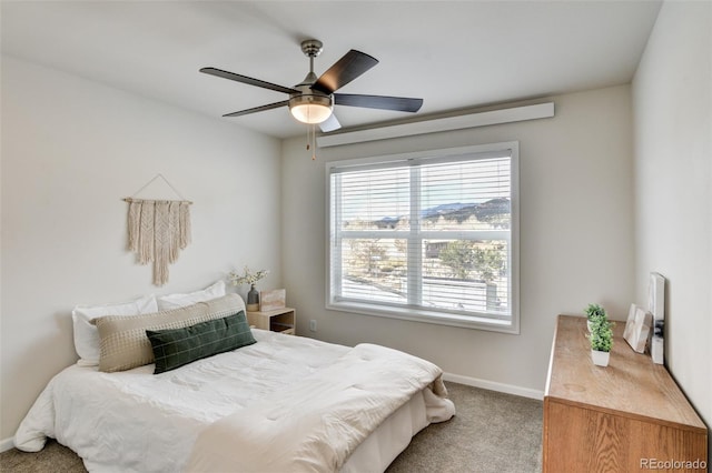 304 Barnwood Dr, Buena Vista, CO 81211 - carpeted bedroom with baseboards and ceiling fan