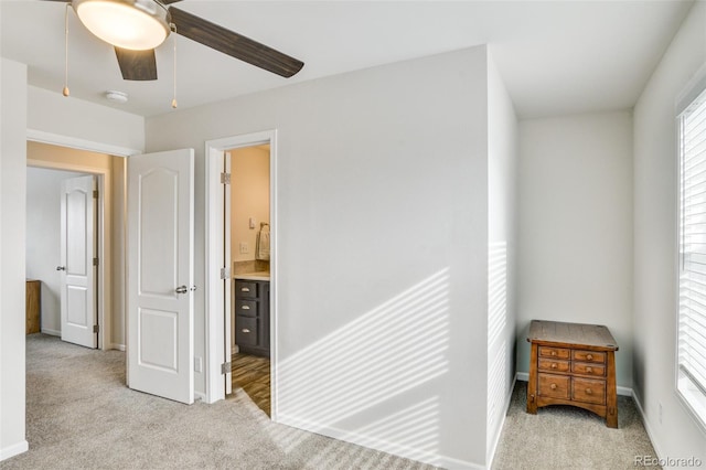 304 Barnwood Dr, Buena Vista, CO 81211 - bedroom with light carpet, multiple windows, and ensuite bathroom