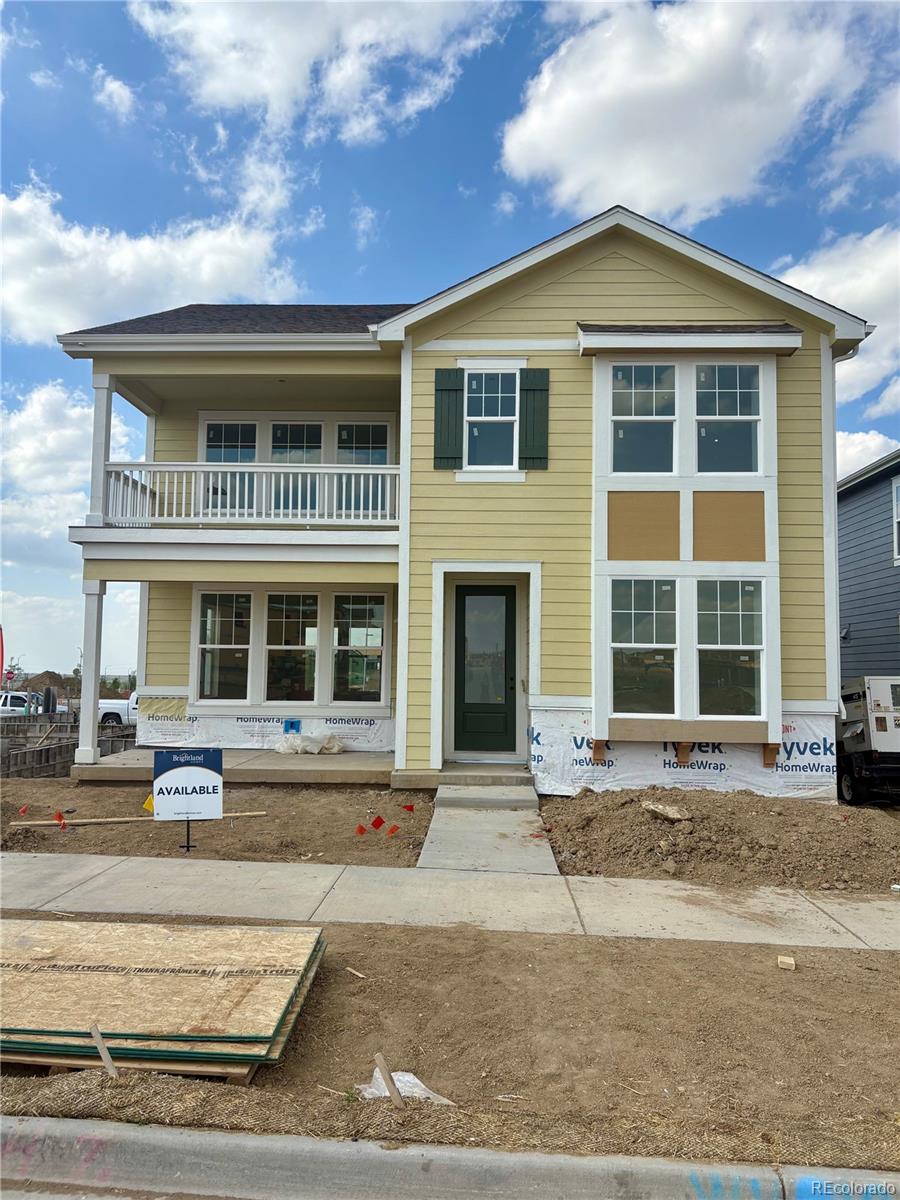 24207 E 53rd Dr, Aurora, CO 80019 - view of front facade featuring a balcony