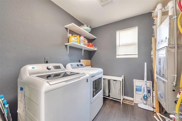 18096 E 104th Way, Commerce City, CO 80022 - laundry room featuring washer and clothes dryer and dark wood finished floors