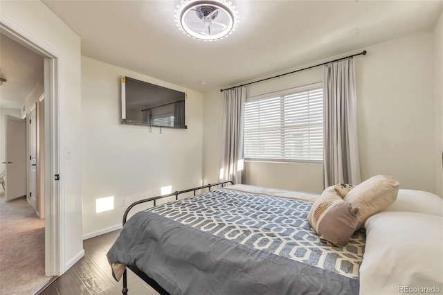 18096 E 104th Way, Commerce City, CO 80022 - bedroom featuring wood finished floors and baseboards