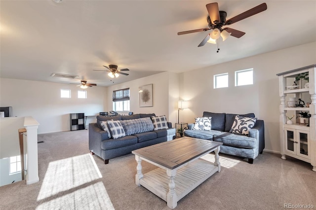 18096 E 104th Way, Commerce City, CO 80022 - living room featuring light carpet, a ceiling fan, and healthy amount of natural light