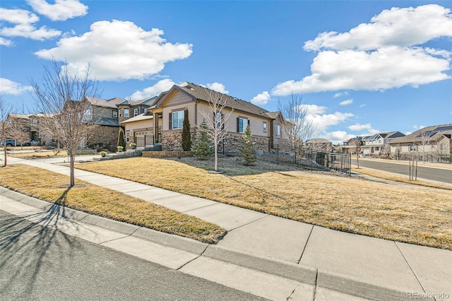 7743 S Quantock Way, Aurora, CO 80016 - craftsman-style house with a residential view and stone siding