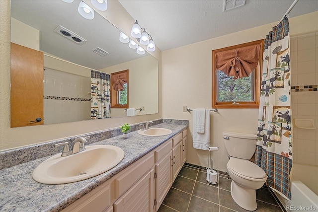 9745 Hilldale Dr, Morrison, CO 80465 - bathroom featuring double vanity, tile patterned floors, shower / bath combo with shower curtain, and healthy amount of natural light