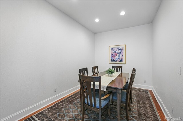 1717 E 22nd Ave, Denver, CO 80205 - dining area with recessed lighting, baseboards, and wood finished floors