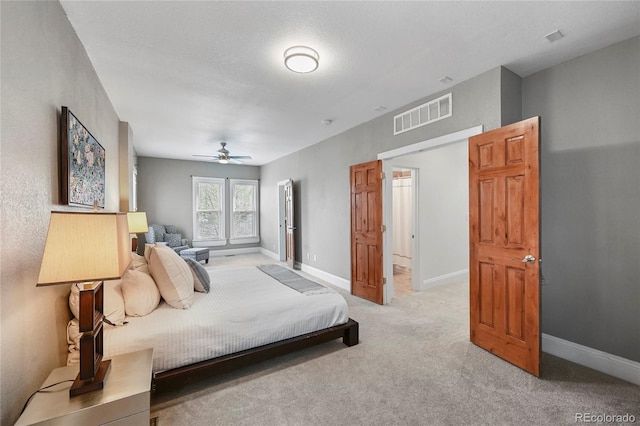 1717 E 22nd Ave, Denver, CO 80205 - bedroom featuring baseboards, visible vents, light carpet, and ceiling fan