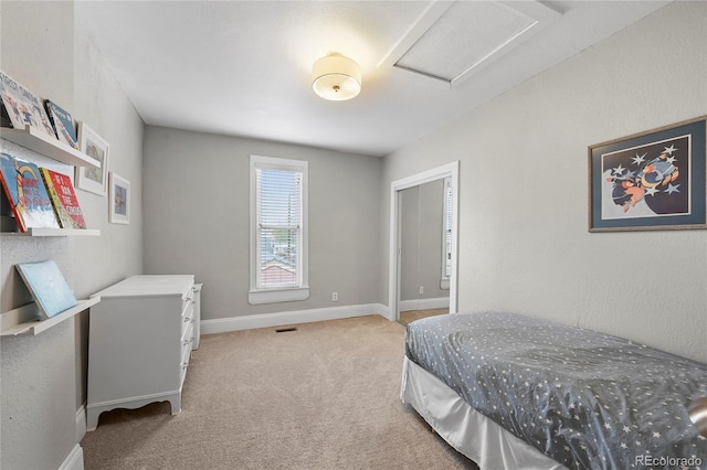 1717 E 22nd Ave, Denver, CO 80205 - carpeted bedroom with baseboards, visible vents, and attic access