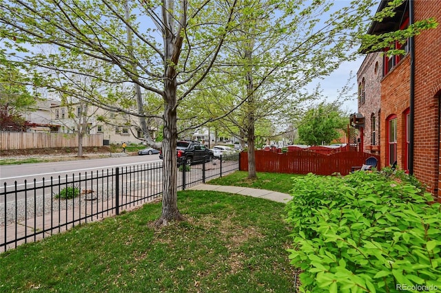 1717 E 22nd Ave, Denver, CO 80205 - view of yard with fence and a residential view