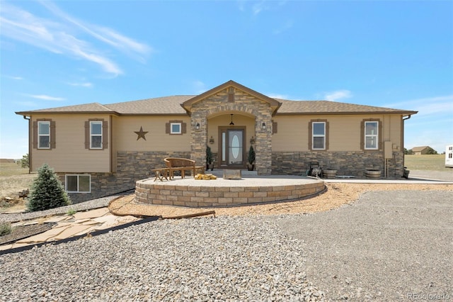3560 Zane Gray Loop, Parker, CO 80138 - view of front facade with stone siding and a shingled roof