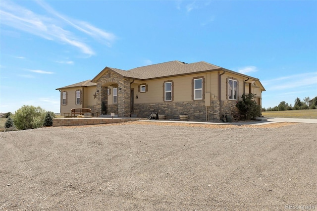 3560 Zane Gray Loop, Parker, CO 80138 - view of front of property with stone siding and roof with shingles