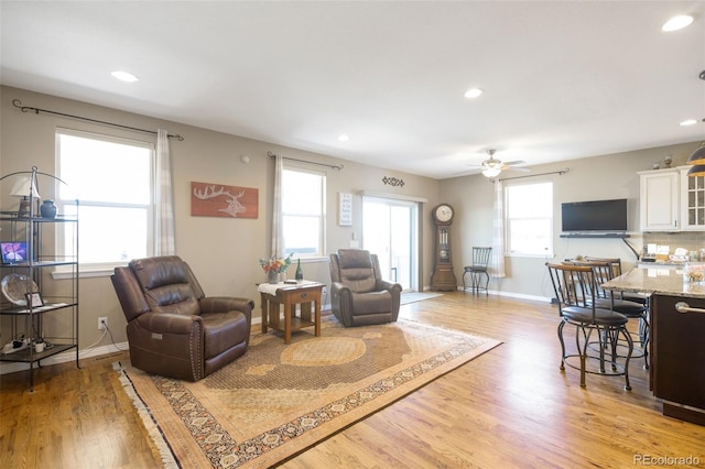 3560 Zane Gray Loop, Parker, CO 80138 - living room featuring light wood-style floors, recessed lighting, and a ceiling fan