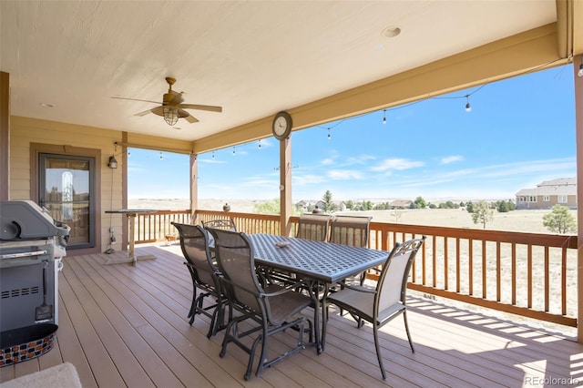 3560 Zane Gray Loop, Parker, CO 80138 - wooden terrace with outdoor dining space, ceiling fan, and grilling area