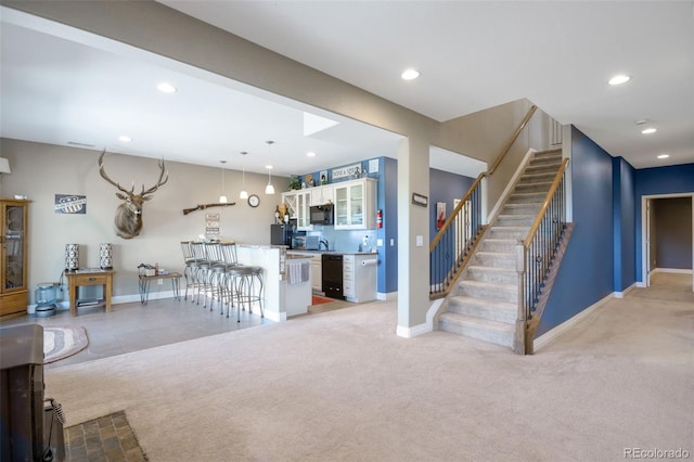 3560 Zane Gray Loop, Parker, CO 80138 - living room featuring stairway, light colored carpet, and recessed lighting