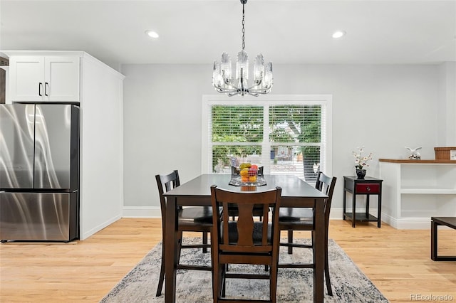 4059 Quivas St, Denver, CO 80211 - dining space with light wood-type flooring, a chandelier, and recessed lighting