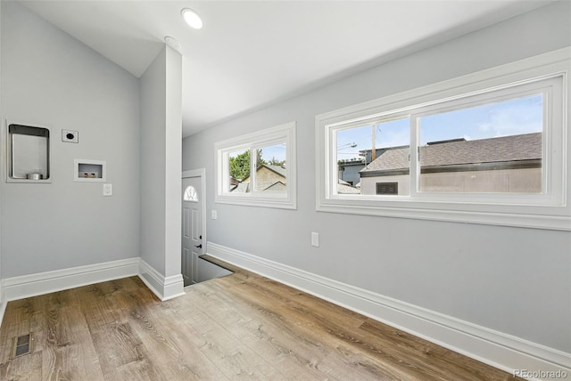 4059 Quivas St, Denver, CO 80211 - laundry area with electric dryer hookup, wood finished floors, and hookup for a washing machine