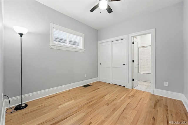 4059 Quivas St, Denver, CO 80211 - unfurnished bedroom with light wood finished floors, a closet, ensuite bath, and ceiling fan