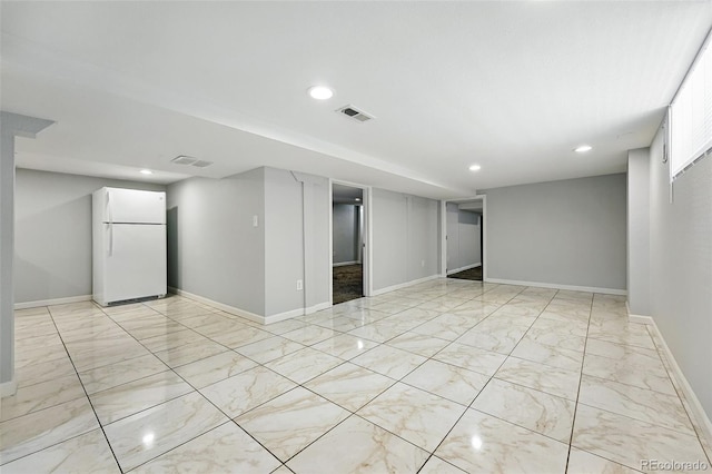 4059 Quivas St, Denver, CO 80211 - finished below grade area with freestanding refrigerator, light marble finish flooring, and recessed lighting