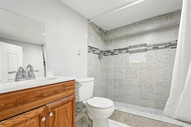 4059 Quivas St, Denver, CO 80211 - bathroom featuring tiled shower and vanity