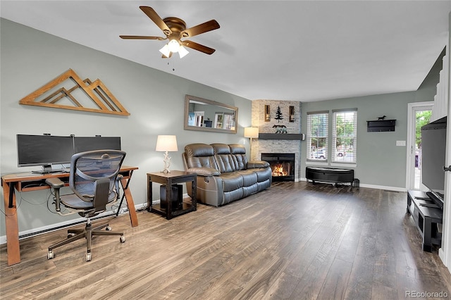 9615 W Chatfield Ave Unit C, Littleton, CO 80128 - office with a stone fireplace, wood finished floors, and a ceiling fan