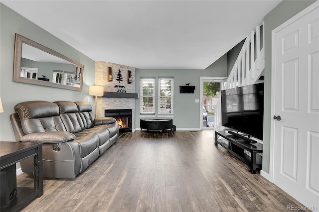 9615 W Chatfield Ave Unit C, Littleton, CO 80128 - living area featuring a fireplace and wood finished floors
