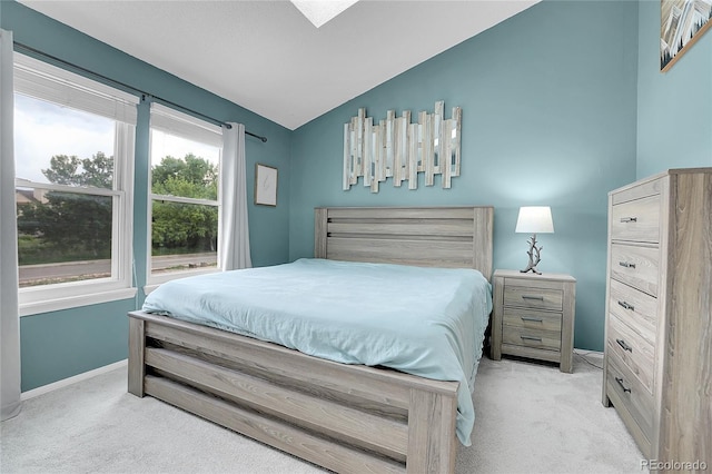 9615 W Chatfield Ave Unit C, Littleton, CO 80128 - bedroom featuring carpet flooring and vaulted ceiling