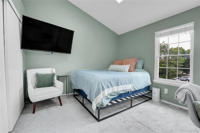 9615 W Chatfield Ave Unit C, Littleton, CO 80128 - bedroom with carpet and vaulted ceiling