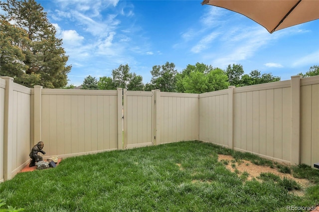 9615 W Chatfield Ave Unit C, Littleton, CO 80128 - view of yard with a gate