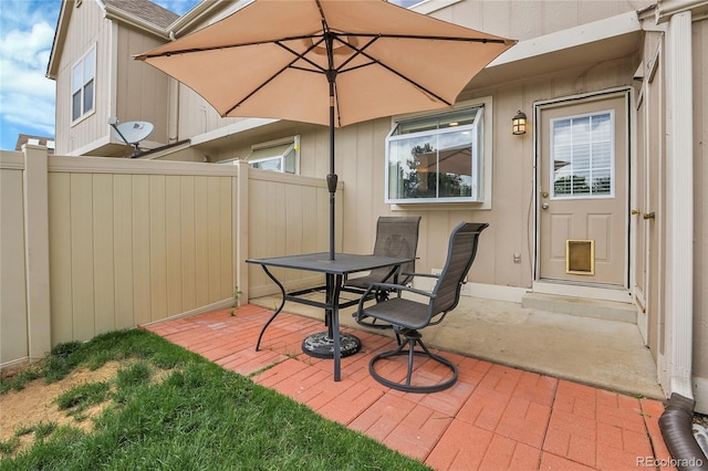 9615 W Chatfield Ave Unit C, Littleton, CO 80128 - view of patio featuring outdoor dining space